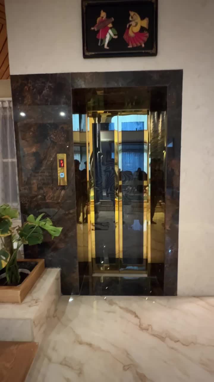 Installed elevator with glass doors